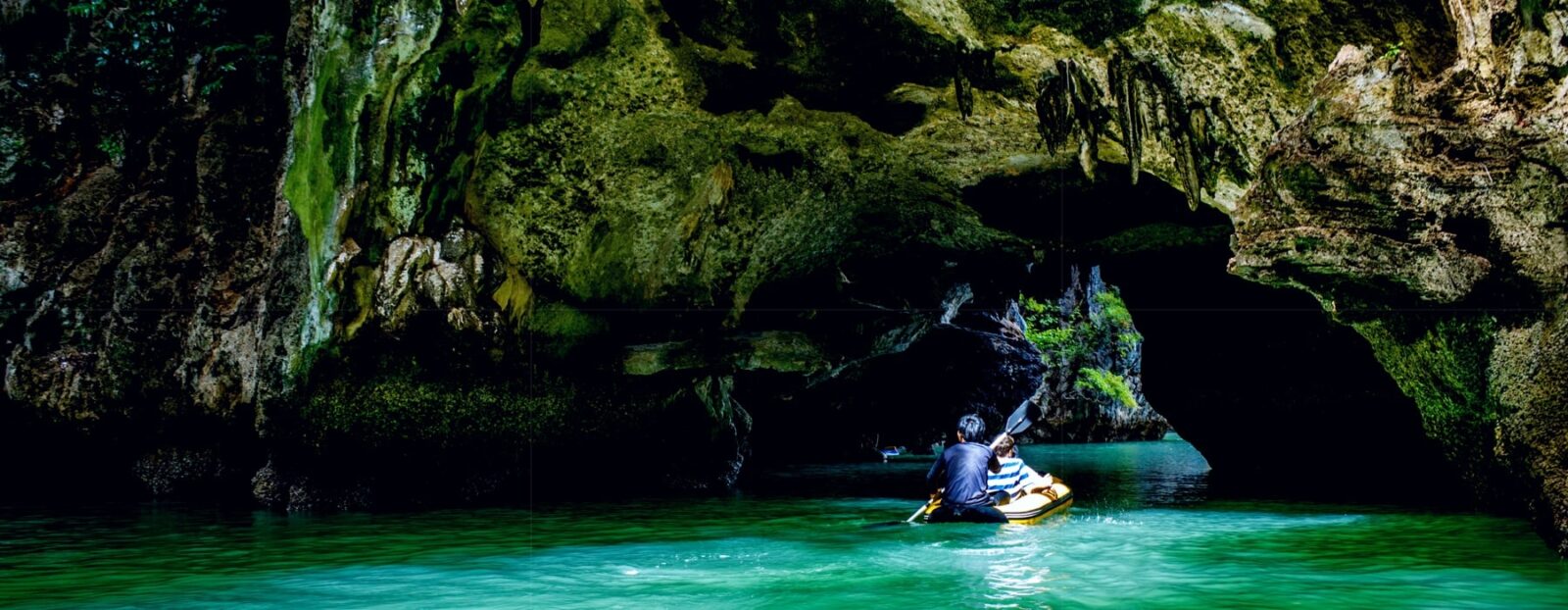 James Bond Island limestone rock formation and canoeing scenery in Phang Nga Bay near Phuket
