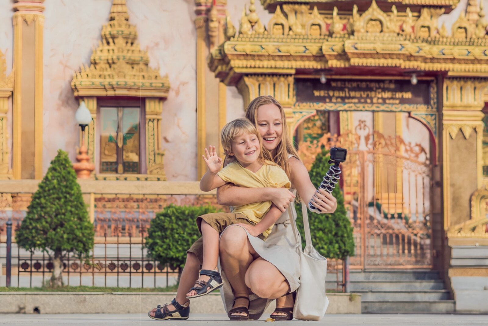 Ornate temple buildings and golden chedi at the Wat Chalong complex